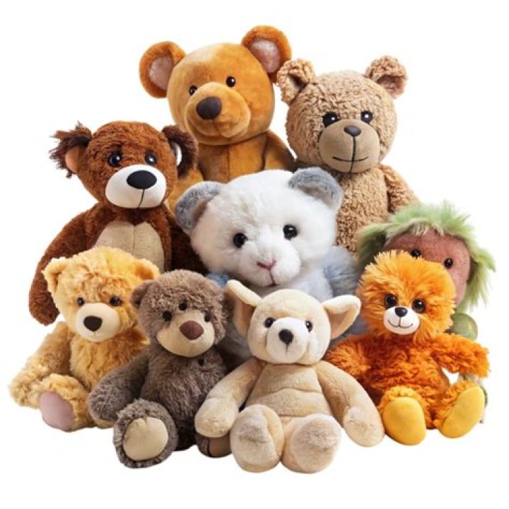 a group of stuffed animals on a shelf