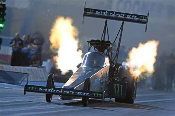Brittany Force throws the first pitch Horsepower & Heels