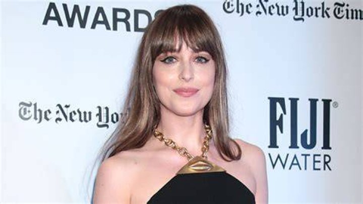 Dakota Johnson Wears Black Bikini As She Hits Beach With BF Chris