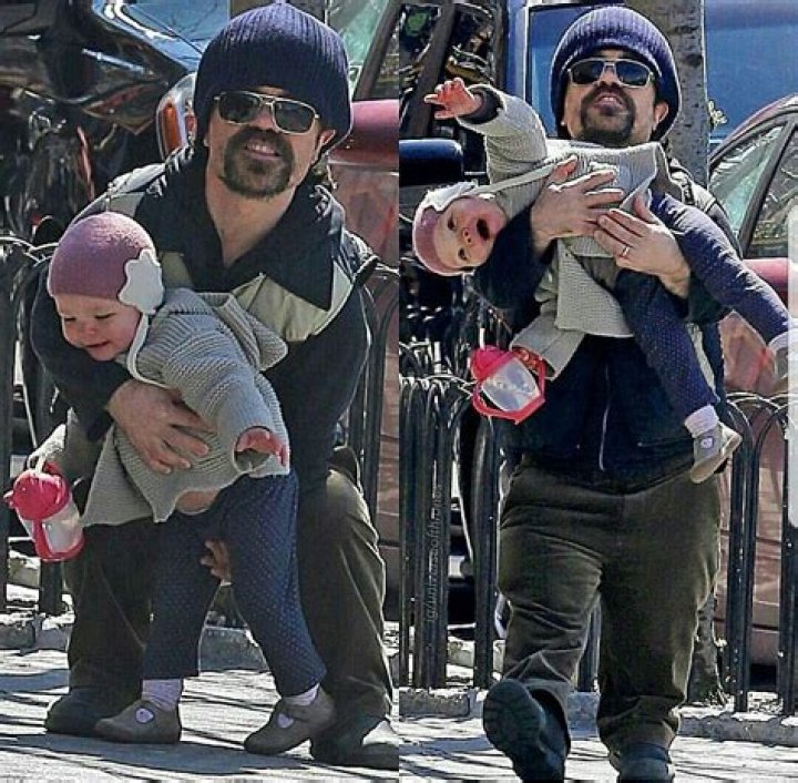 Peter Dinklage steps out for a stroll with his wife Erica and daughter