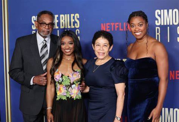 Simone Biles and her Grandparents, Ron and Nellie Biles at the White